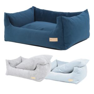 A cozy dog sofa bed with a pillow